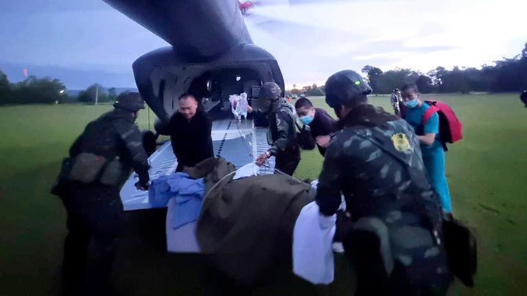 An injured Thai soldier who stepped on a land mine being airlifted to a hospital in Ubon Ratchathan, Thailand.
Pic: The Royal Thai Army/AP