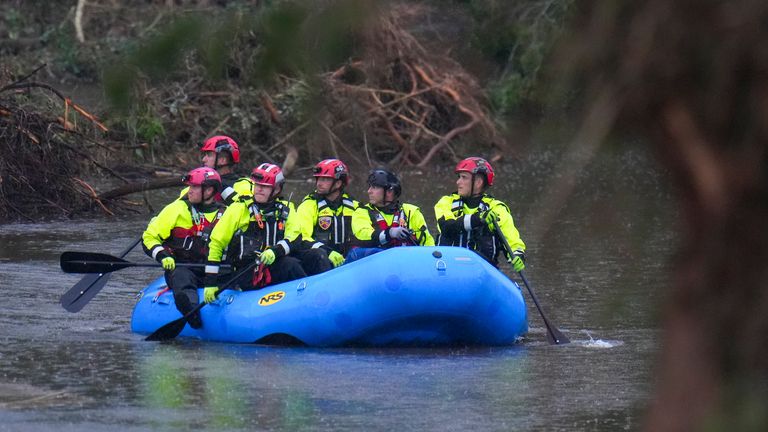 Rescuers at Camp Mystic along the Guadalupe River in Texas after a flash flood swept through the area. Pic: AP