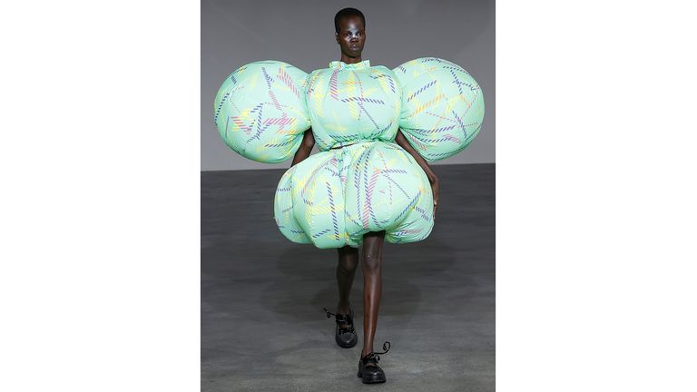 A catwalk model wears an air-conditioned outfit  by Anrealage.
Pic: NOWFASHION/Shutterstock

