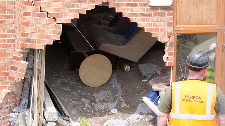 The scene outside Highcliffe Care Home in Witherwack, Sunderland, after a car crashed into the building during a police chase.
Pic: PA
