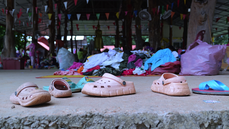 Clothes brought by Thai evacuees at Baan Nong Sanom Temple in Si Sa Ket province, Thailand
