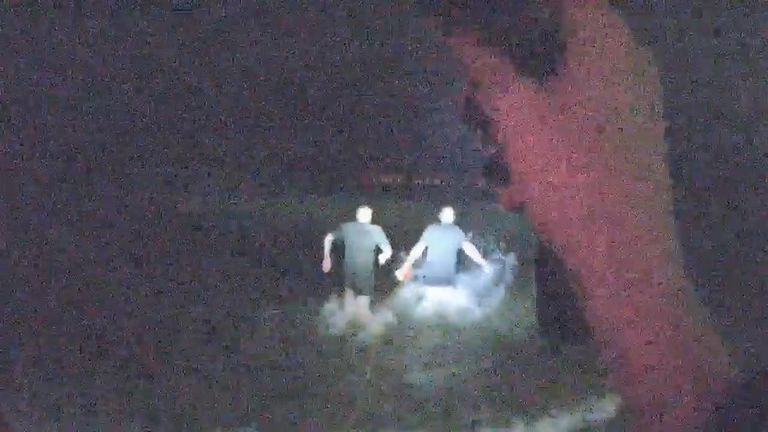 Footage of Sergeant Craig Lees and Sergeant Matthew Seekings rescuing a woman from the sea in Brighton. Pic: Sussex police
