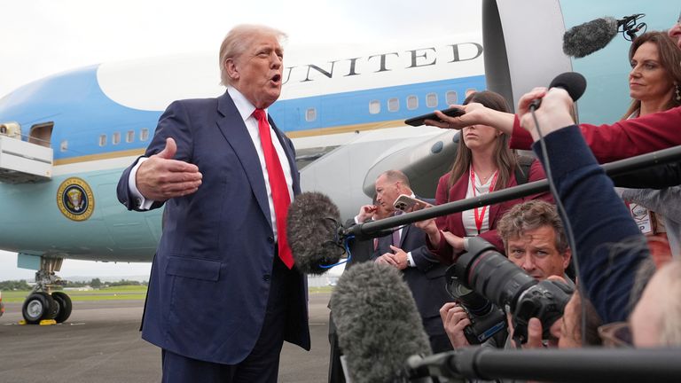 President Donald Trump speaks to members of the media after he arrived at Prestwick Airport in Ayrshire, Scotland, Friday, July 25, 2025.(AP Photo/Jacquelyn Martin)