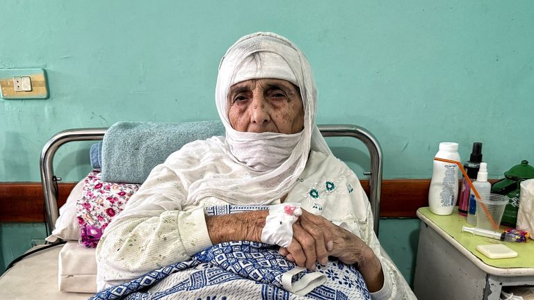 An elderly woman in hospital