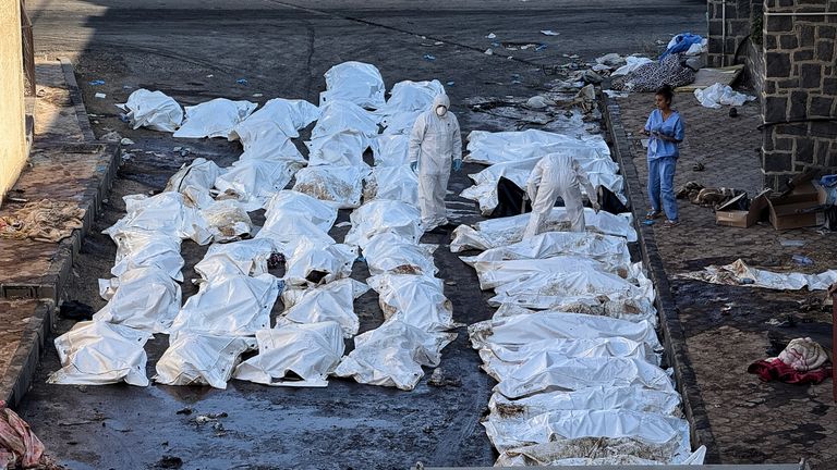 Body bags outside the hospital