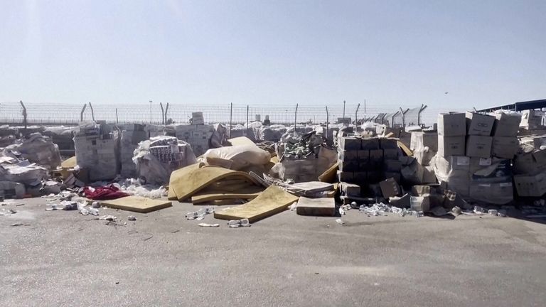 Israel military shows what it claims is aid awaiting collection Gaza-side of Kerem Shalom crossing
