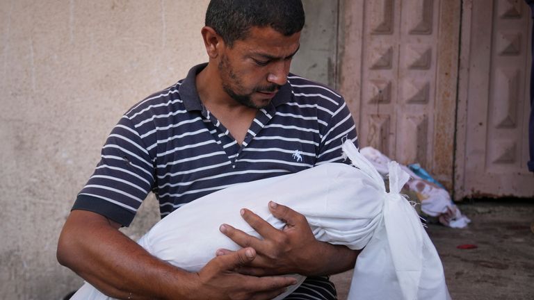 Ten children among at least 15 killed waiting for Gaza health clinic to open, says aid group