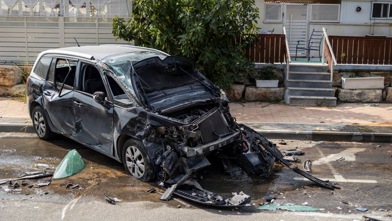 A destroyed car near the police station in Sderot, following the 7 October attacks by Hamas. Pic: AP