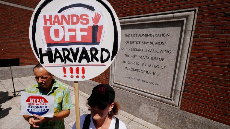 Demonstrators join the group Crimson Courage, who gathered to support Harvard University during a hearing before a federal judge to order U.