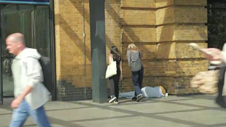 Ms O'Farrell and Ms Godsal check on a homeless person