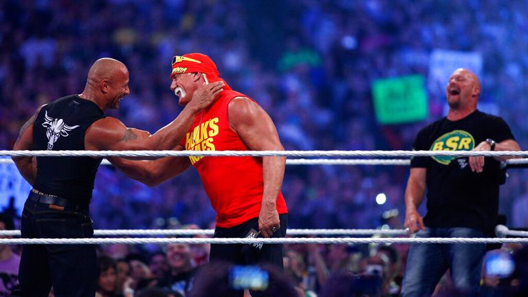 Hulk Hogan face to face with The Rock in 2014. Pic: AP