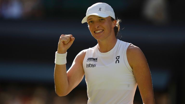 Jul 10, 2025; Wimbledon, United Kingdom; Iga Swiatek of Poland celebrates winning her match against Belinda Bencic of Switzerland on day 11 