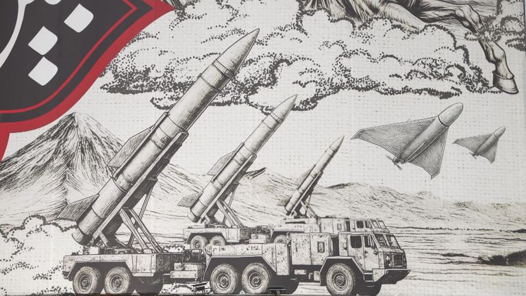 The billboard illustrates the 7th century imam on horseback alongside missiles and drones from the present day