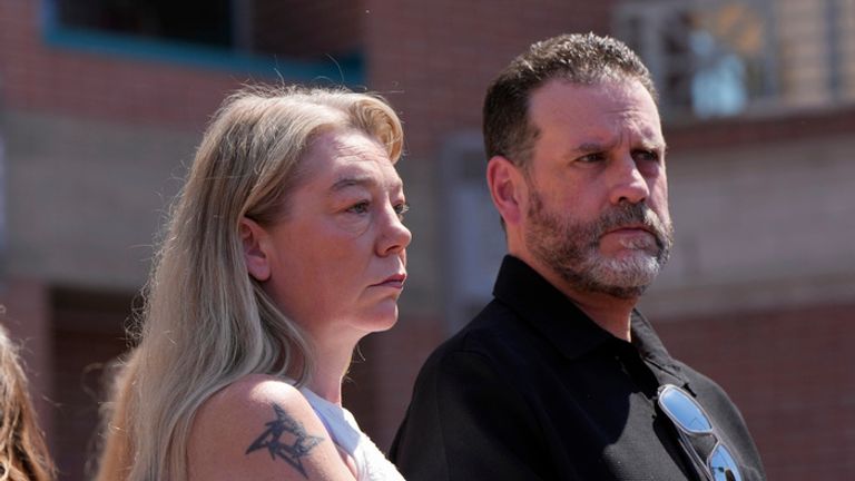 Karen and Scott Laramie, the mother and stepfather of Madison Mogen, listen as their lawyer reads the statement. Pic: AP