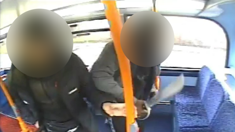 The two boys who attacked Kelyan Bokassa caught on CCTV, with one seen brandishing a machete, faces blurred. Pic: Met Police