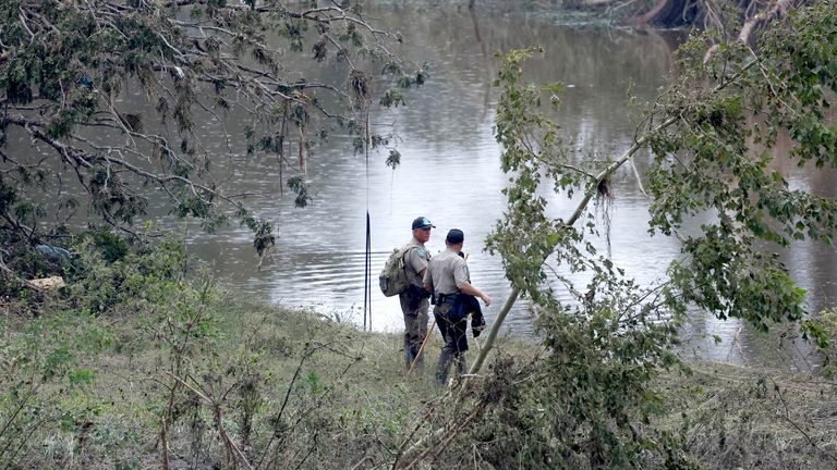 Members from Texas Game Wardens of the Law Enforcement Division works following flash flooding, in Kerrville, Texas.
Pic: Reuters