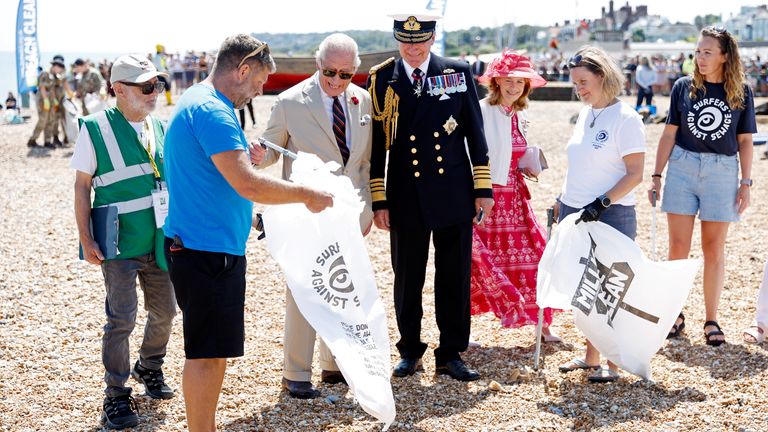 "Those shingles are very hard work," the King told locals after he took part in a litter pick.
Pic: PA