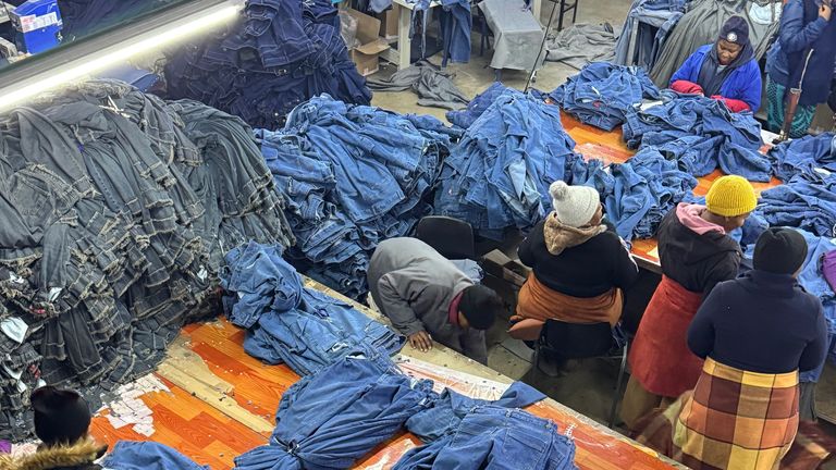 A government-sponsored warehouse in Maputosoe, Lesotho - 5km away from South Africa - where women make clothes