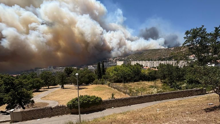 Smoke rising from a wildfire in Marseille on 8 July 2025. Pic: Reuters