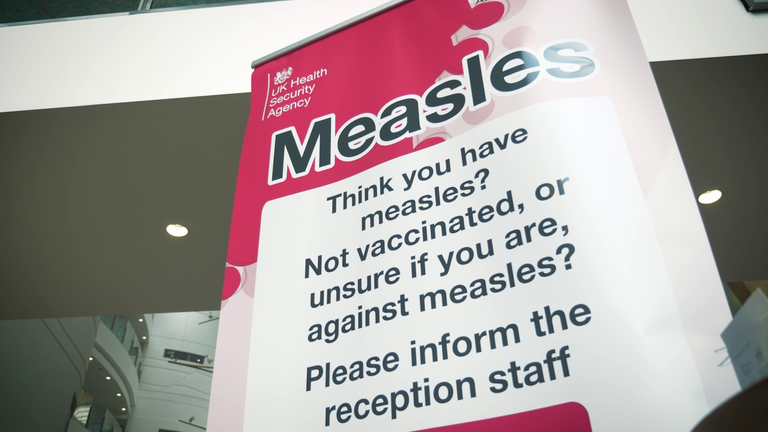 A sign from the UK Health Security Agency about measles vaccination