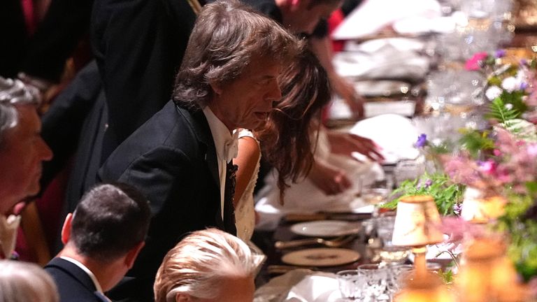 Mick Jagger taking his seat at the state banquet at Windsor Castle. Pic: PA 