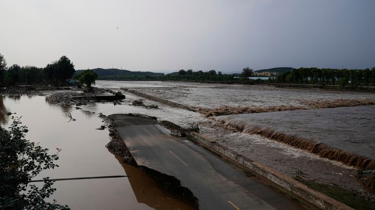 A damage road in the Miyun district. Pic: AP