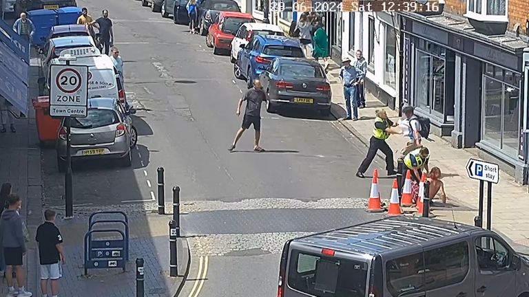 CCTV image of PC Nicola Crabbe from Wiltshire police dealing with a fight in Devizes. Pic: Wiltshire police