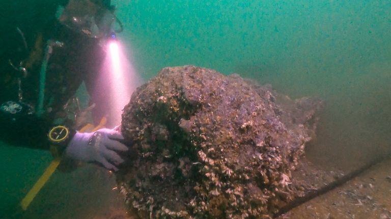 A diver and the muzzle end of a gun. Pic: Michael Pitts/History Hit