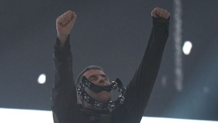 Liam Gallagher carried a tambourine in his mouth during the concert. Pic: PA