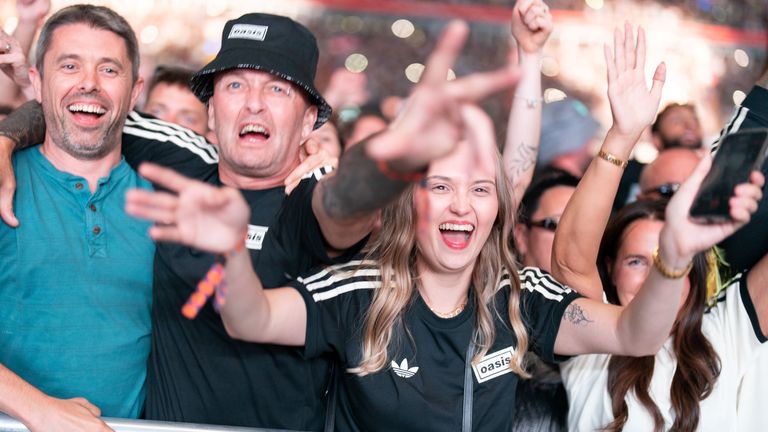Fans at the Oasis gig. Pic: PA