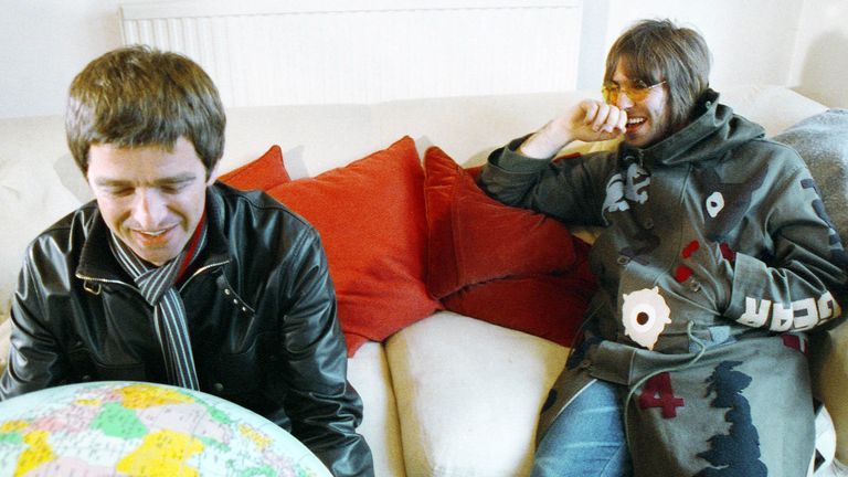 Noel and Liam Gallagher returning to the house where the cover for Definitely Maybe was shot. Pic: © Michael Spencer Jones