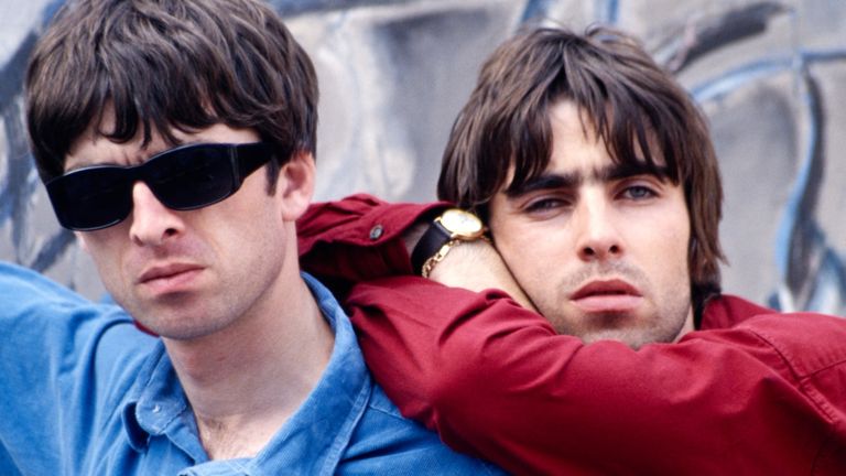 Oasis stars Noel and Liam Gallagher in Portland Street, Manchester, in August 1995. Pic: Kevin Cummins