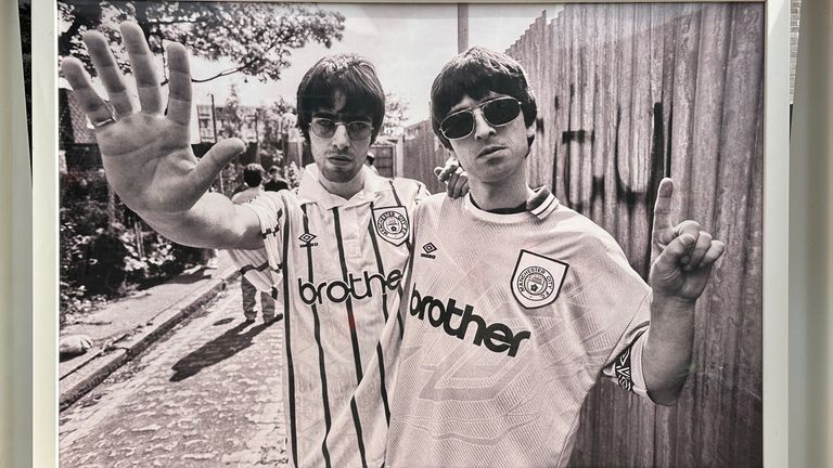 Photos of Oasis taken by Kevin Cummins are on display at Wembley Park throughout the summer. Pic: Kevin Cummins/ Iconic Images 2025