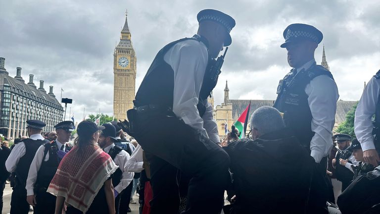Police said the protesters were breaking the law as the group is now banned
