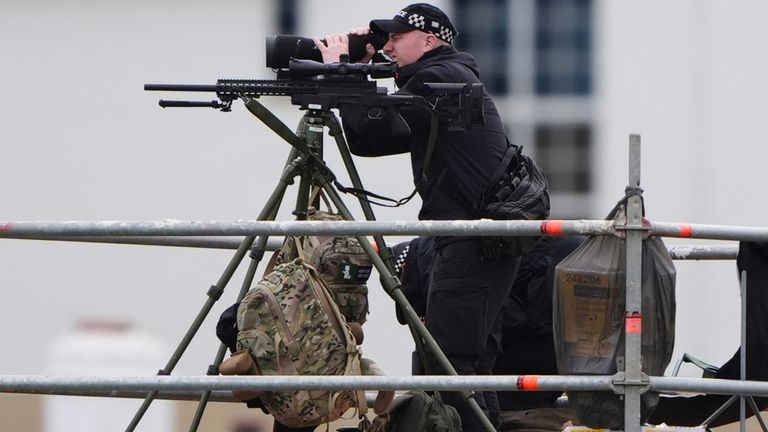 Specialist rifle officers on the lookout at Trump Turnberry. Pic: PA