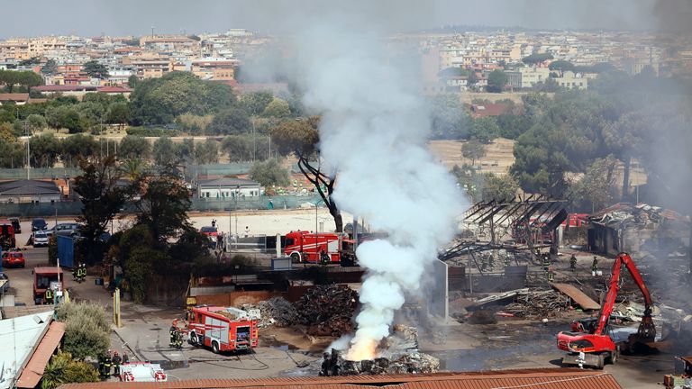 Smoke rises after a gas station exploded on the outskirts of Rome. Pic: AP