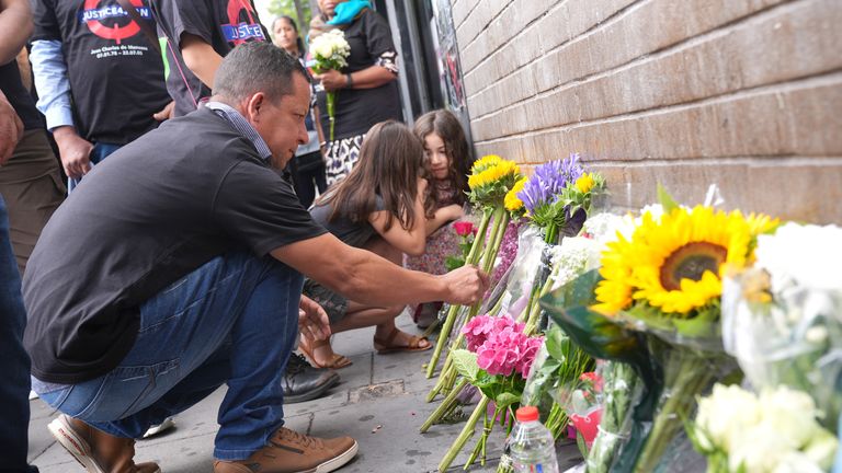 The family of Jean Charles de Menezes lay sunflowers among  outside Stockwell Station. File pic: PA