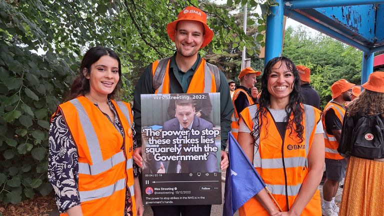 (Left to right) Dr Sunna Ali, Dr Alex Gibbs, Dr Mandeep Grewal protest with NHS resident doctors outside outside the King George Hospital in