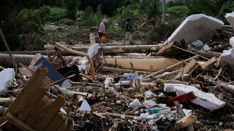 China floods: At least 30 killed in Beijing and 80,000 evacuated.