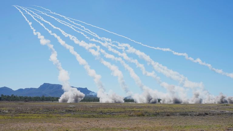 Rockets are launched from a High Mobility Artillery Rocket System during Exercise Talisman Sabre 2025, Australia's largest-ever war fighting drills at Shoalwater Bay Training Area, near Rockhampton, Australia, Monday, July 14, 2025. (AP Photo/Rick Rycroft)