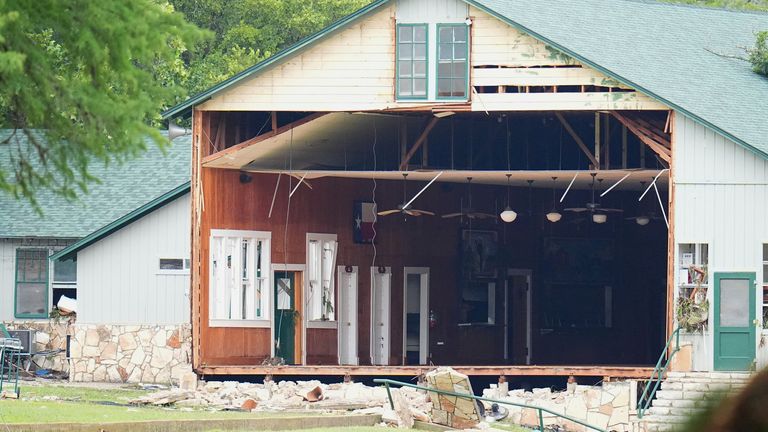 A wall is missing on a building at Camp Mystic in Hunt, Texas. Pic: AP/Julio Cortez