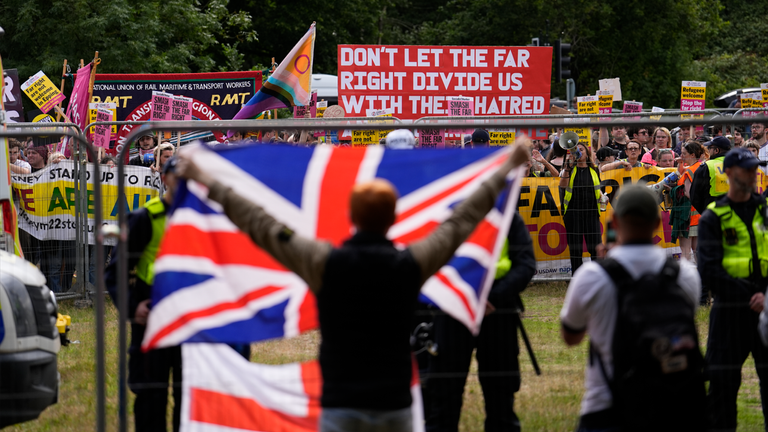 Protesters and counter-demonstrators outside The Bell Hotel. Pic: PA