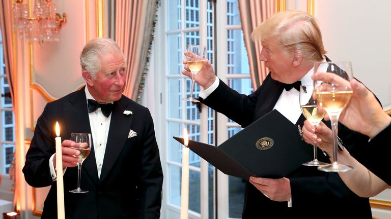 The King and Mr Trump raising a toast in 2019. Pic: Reuters