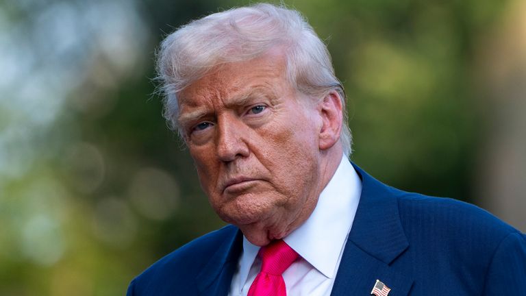 FILE - President Donald Trump walks from Marine One after arriving on the South Lawn of the White House, Tuesday, July 15, 2025, in Washingt