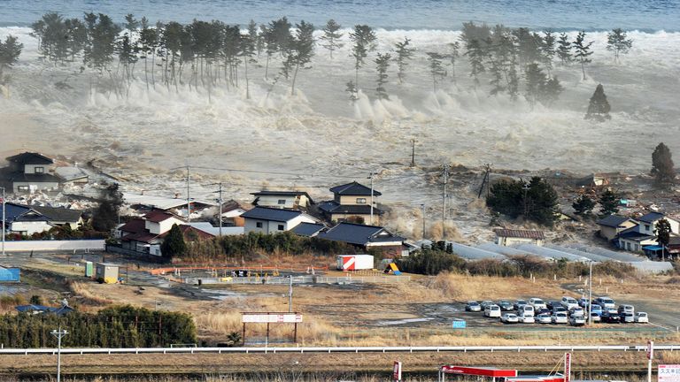 Helicopter view of tsunami engulfing costal region in Northeastern Japan on 11 March 2011. Pic: Kyodo/AP