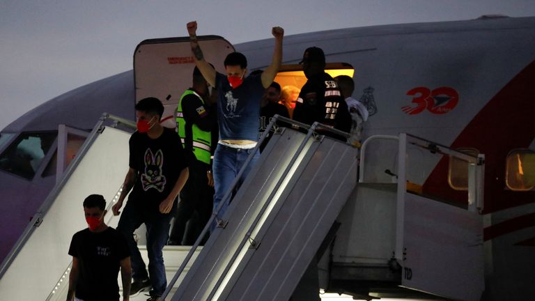 Venezuelans arrive back in home country after being detained in El Salvador 