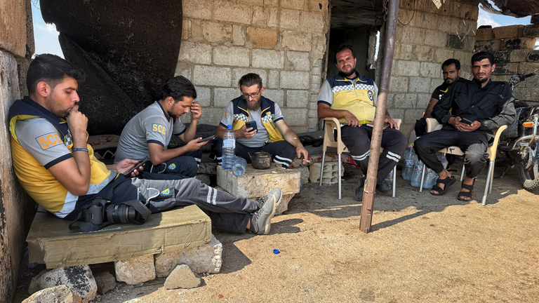 White Helmets wait