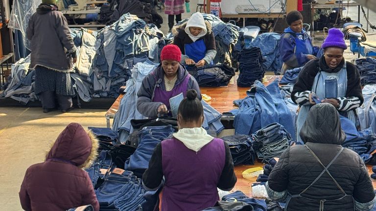 A government-sponsored warehouse in Maputosoe, Lesotho - 5km away from South Africa - where women make clothes