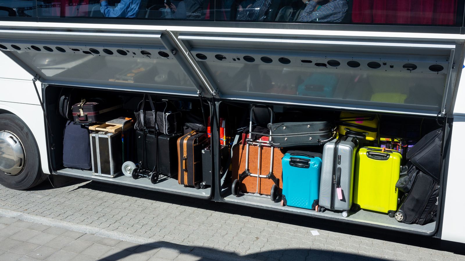 Two-year-old girl found alive in suitcase as woman charged with child neglect