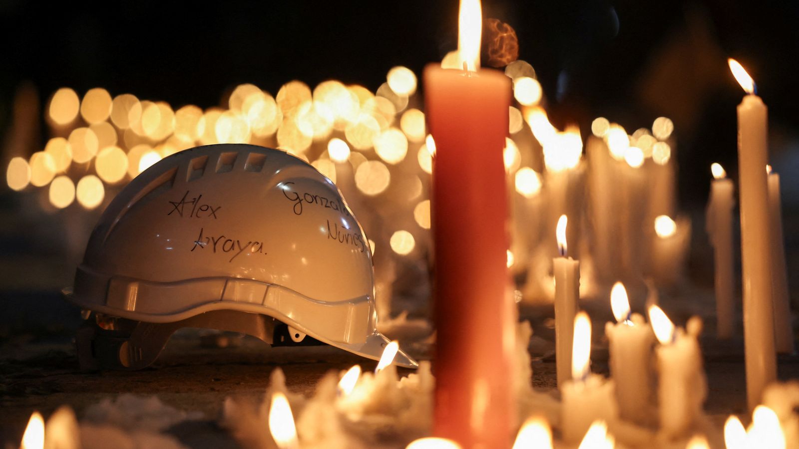 Rescue crews searching for five trapped Chilean miners find body